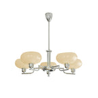 Five-head chrome Clérachic chandelier on white, amber-beige glass domes on polished arms under a silver canopy.