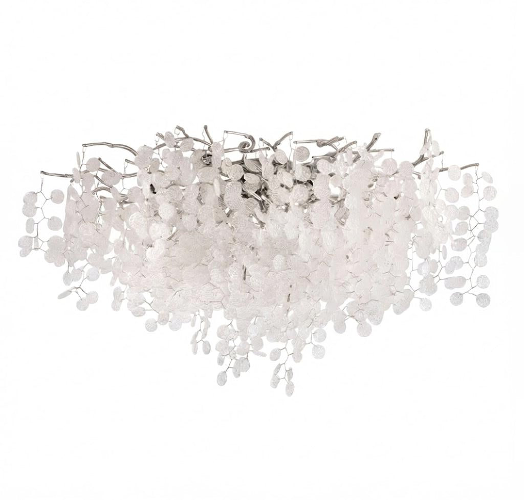This Clérachic ceiling light in its silver finish sits on a white background, with clear glass discs cascading from its branches.