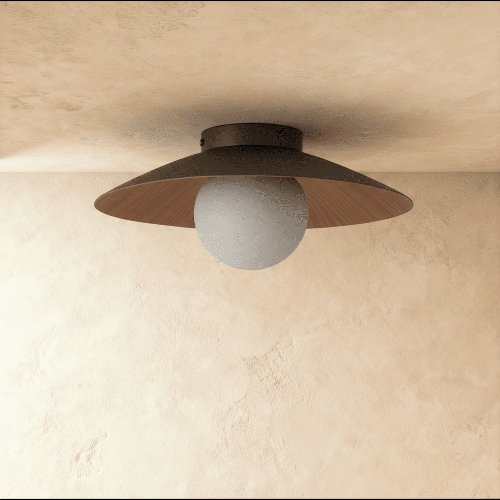 Clérachic flush ceiling light switched off, with a broad dark brown disc shade and a pale frosted globe against a plaster ceiling.
