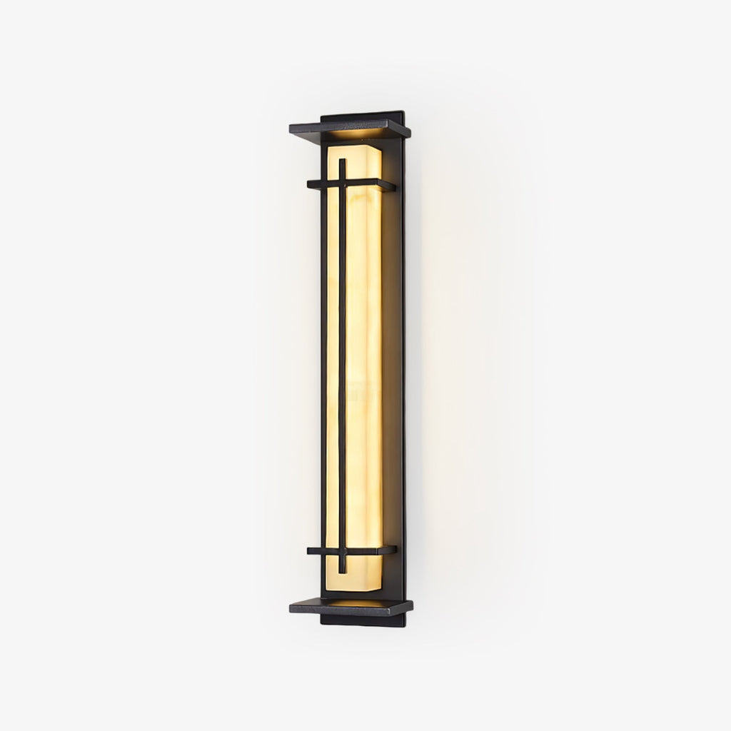 Tall rectangular outdoor wall light from Clérachic, lit warm amber inside a slim dark metal frame, on a plain white backdrop.