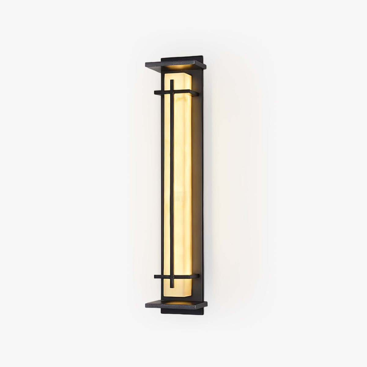 Tall rectangular outdoor wall light from Clérachic, lit warm amber inside a slim dark metal frame, on a plain white backdrop.