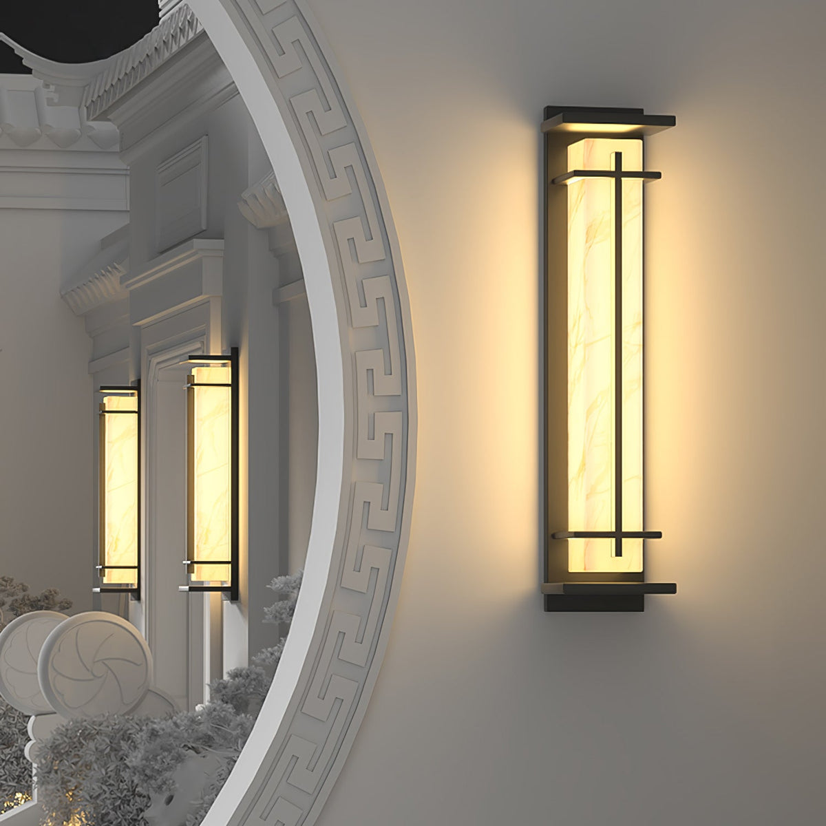 Clérachic wall light lit on a white wall beside a curved ornamental opening, two smaller lights glowing in the arch beyond.