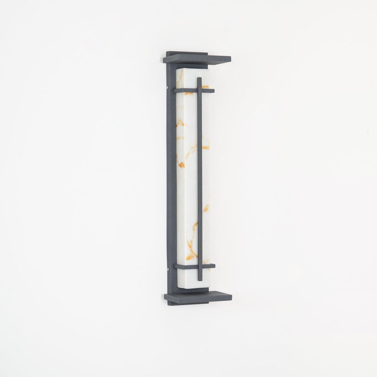 Close view of the unlit wall light, golden marks in its white shade and a grey metal frame, on a white wall; from Clérachic.