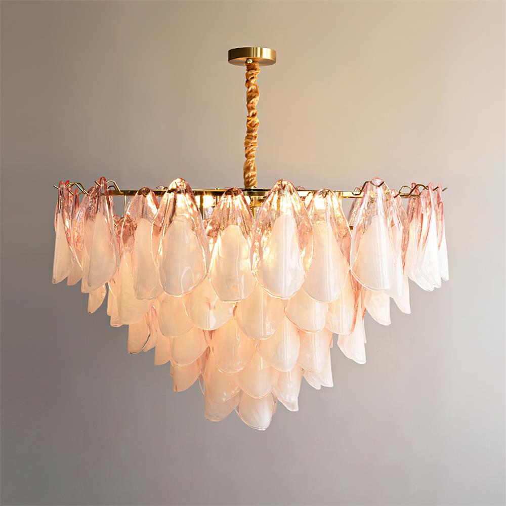 Clérachic chandelier in blush pink glass petals hung from a twisted brass rod instead of a chain.