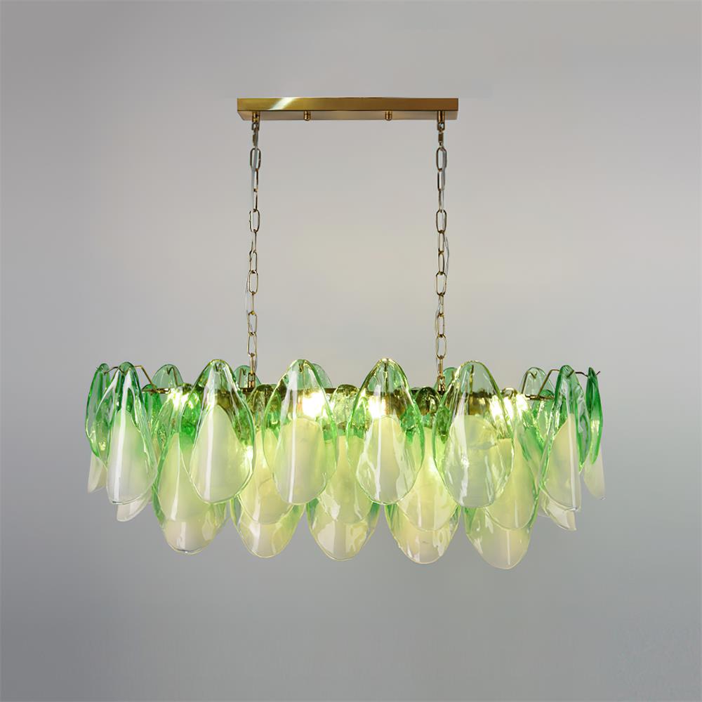The Clérachic chandelier in sage green glass petals hangs on a brass chain, photographed head-on.
