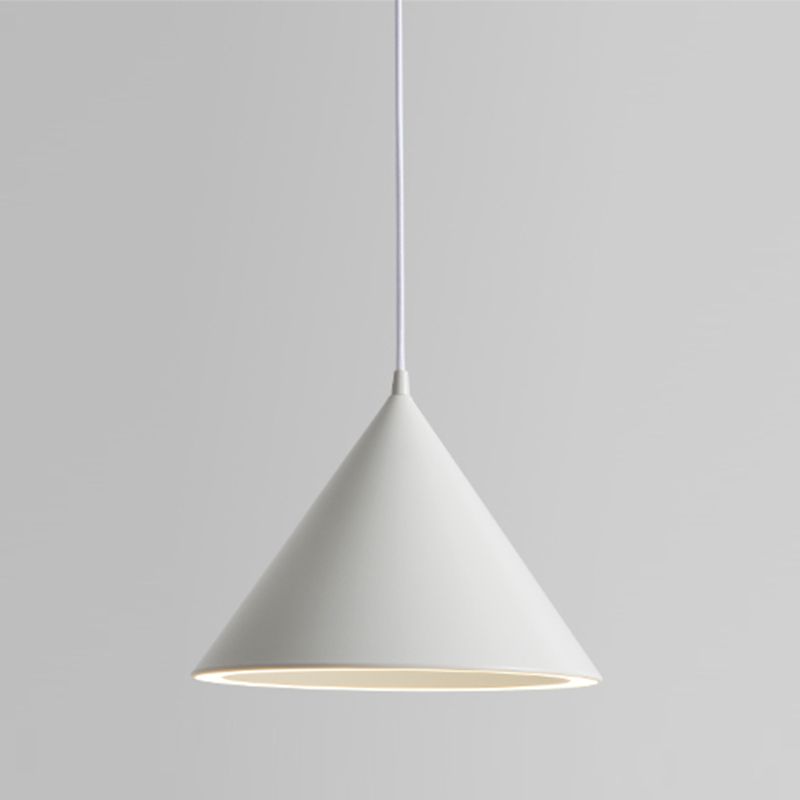 The Clérachic Funnel Pendant Light in white, hung on a matching white flex so shade and cord read as one unbroken line.