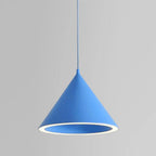 The Clérachic Funnel Pendant Light in blue, cord and shade finished in the same tone, with the diffuser ring lit around the mouth.