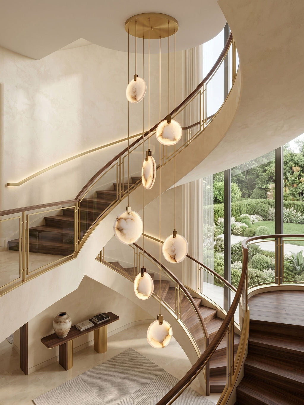 Lit alabaster disc pendants from Clérachic fall past a sweeping cream staircase with timber treads and a garden view.