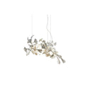 Clérachic gingko chandelier on white, a compact spray of pale ceramic leaves on slender stems.