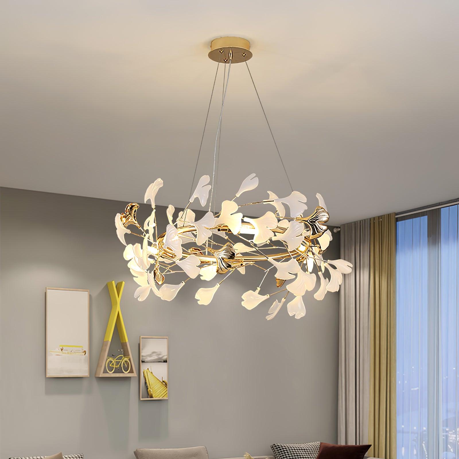 The Clérachic gingko ring lit beside a yellow-framed shelf and a bicycle print.