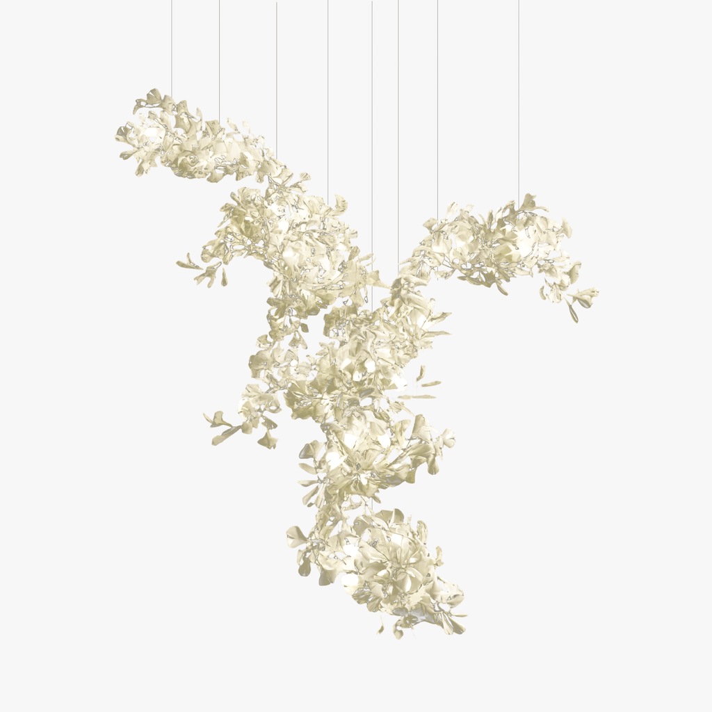 The Clérachic gingko chandelier on white, its leaf clusters suspended on fine cables.