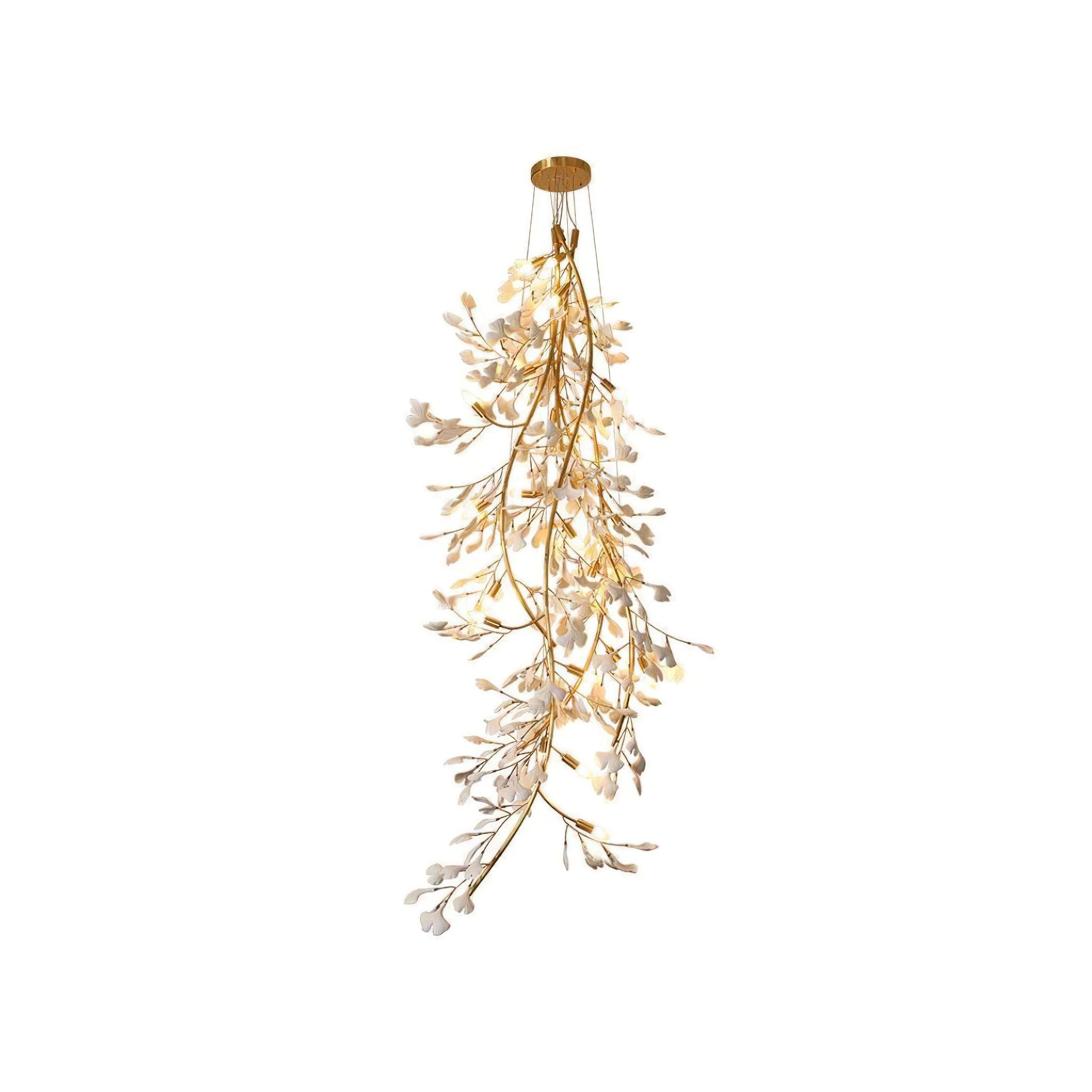 Clérachic gingko branch chandelier on white, a long cascade of ceramic leaves down a gold stem.