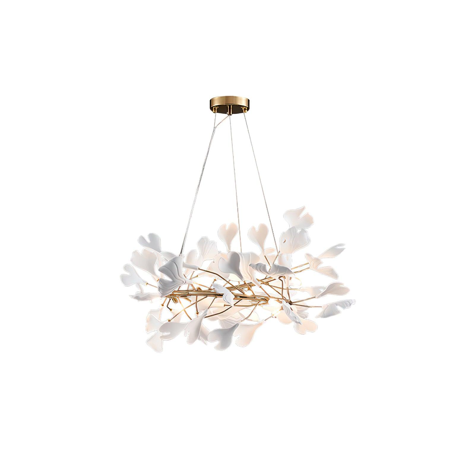 Clérachic gingko chandelier, porcelain leaves ringing a gold branch frame on white.