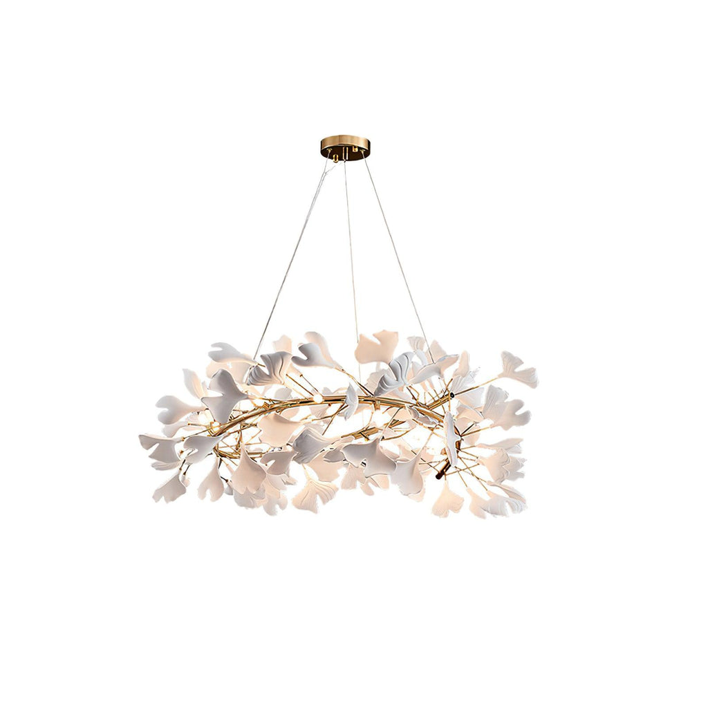 The Clérachic gingko chandelier seen wider, its leaf ring dense around the gold armature.