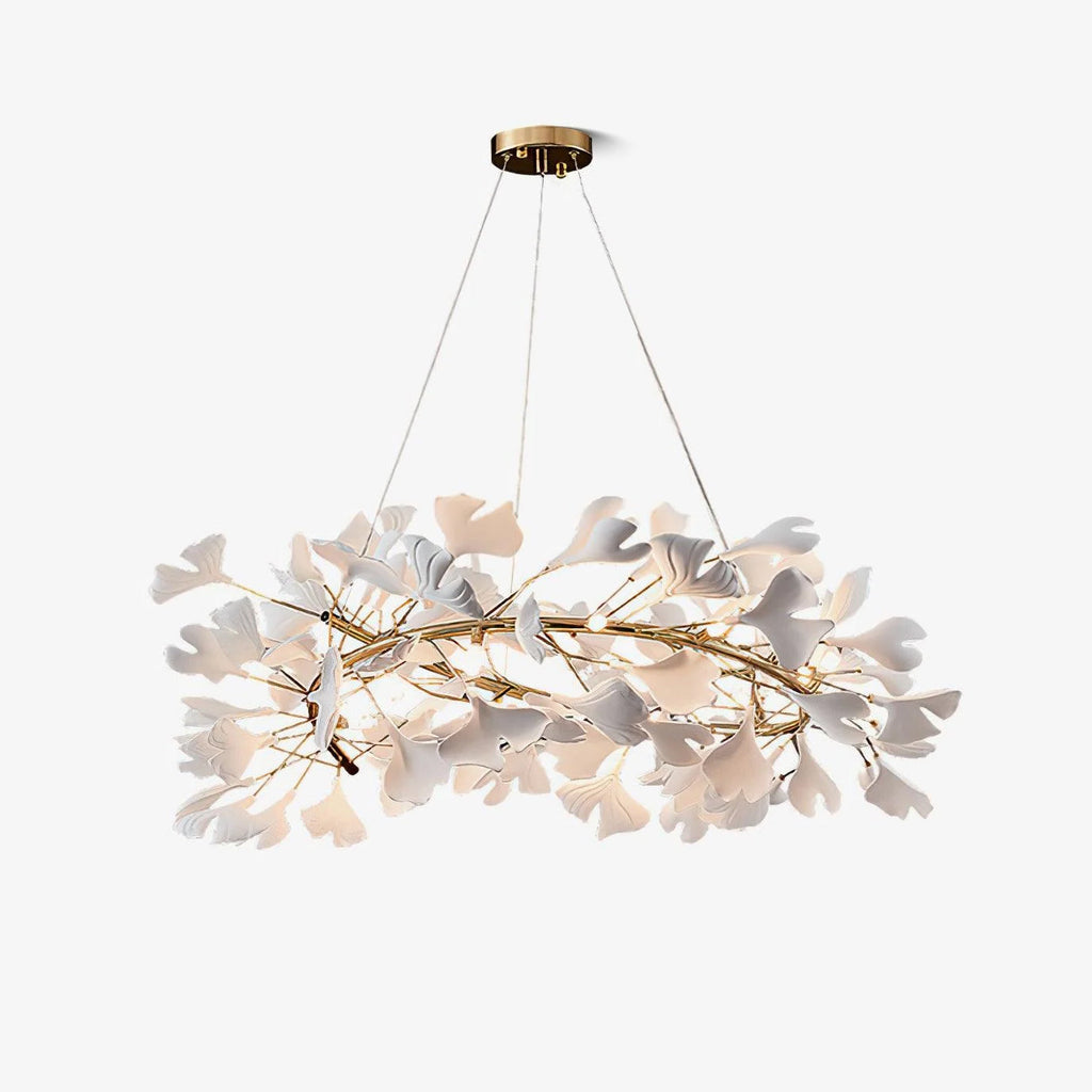 The largest Clérachic gingko ring on white, leaves massed thickly along the gold frame.
