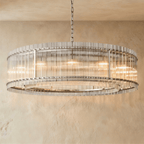 Clérachic widest drum chandelier of fluted glass rods with polished nickel studs and a tiered inner ring on a chain.