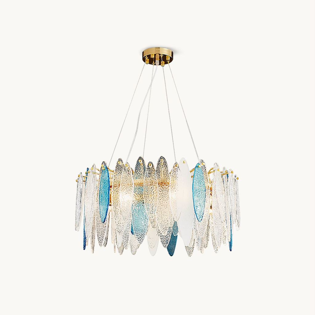 Round Clérachic glass chandelier on a plain white backdrop, with clear and blue leaf-shaped panels on a gold frame.