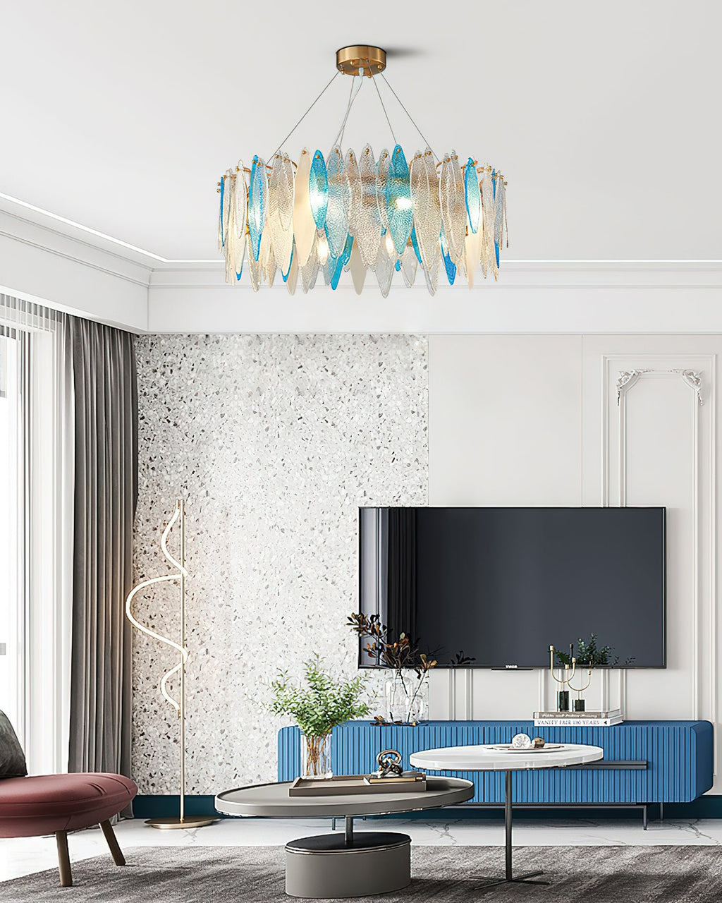 Clérachic leaf-glass chandelier centred in a white living room with a wall-mounted TV on a blue unit.