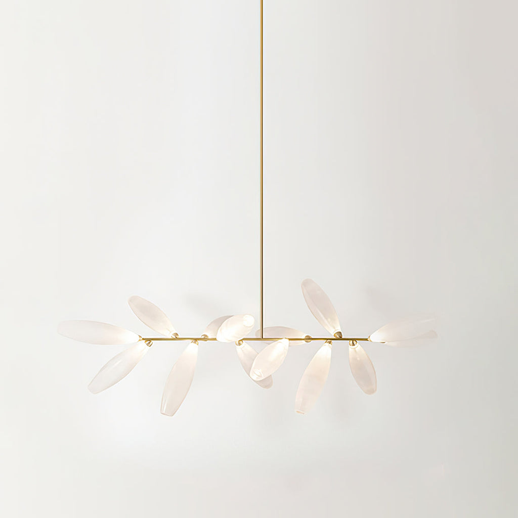 A linear Clérachic chandelier of frosted glass leaves hangs from a long gold rod against a pale backdrop, with a short cluster of leaves on each side.