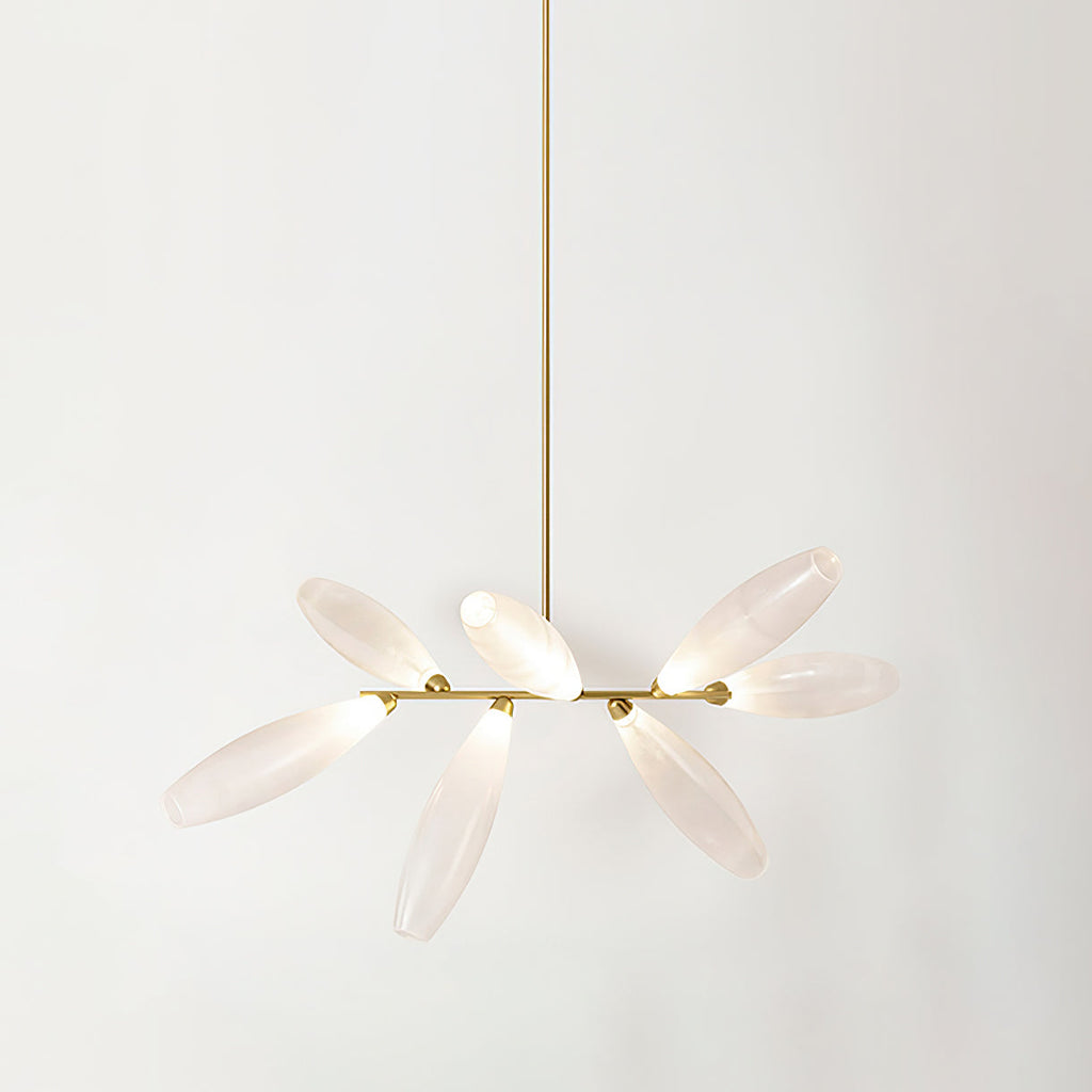A short linear Clérachic chandelier of frosted glass leaves on a long gold rod, lit softly against a pale backdrop.
