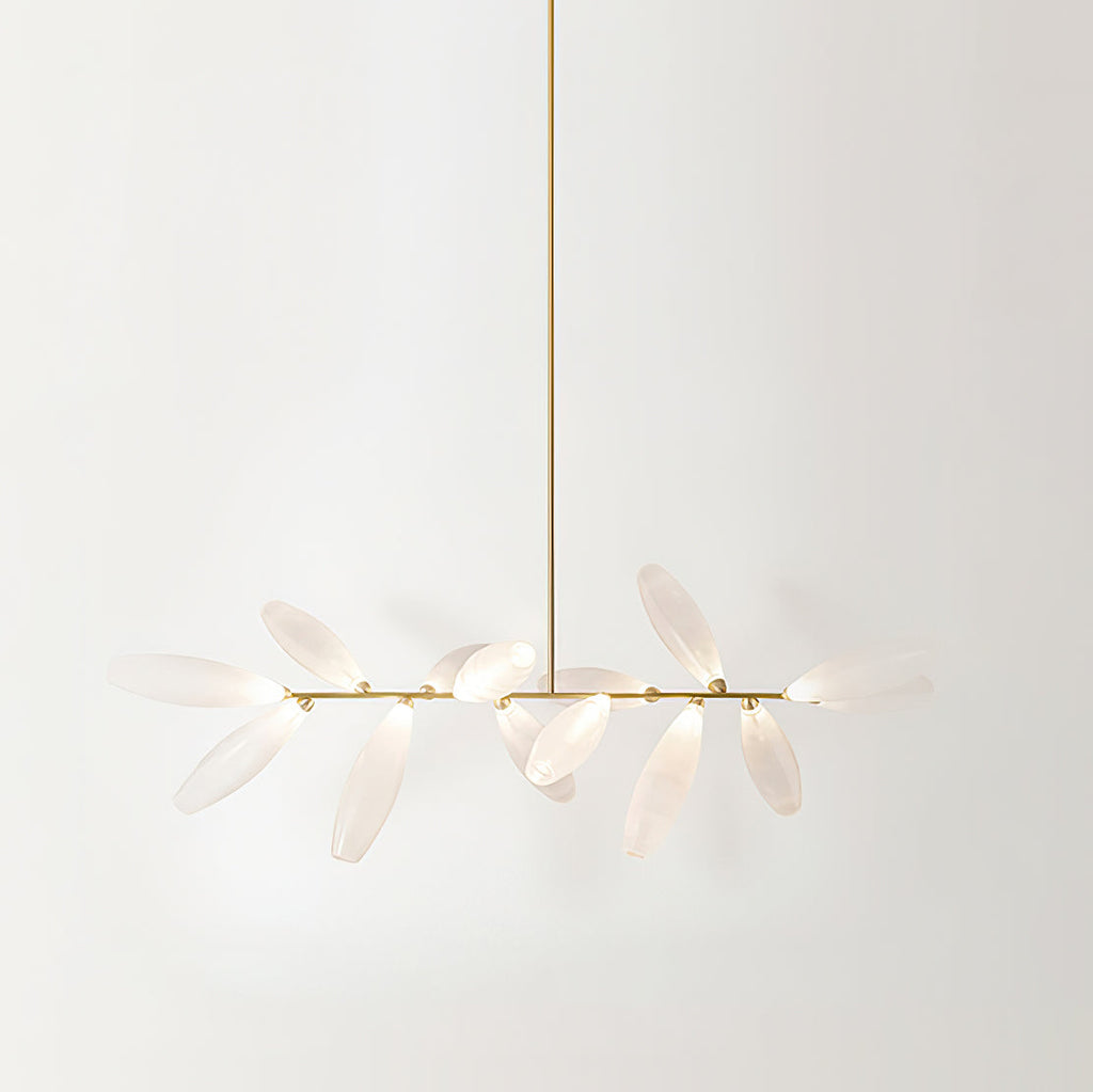A linear Clérachic chandelier seen from a low angle, its frosted white glass leaves on a gold bar hanging from a long gold rod.