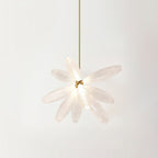 A cluster of frosted glass leaves fanning out from one gold joint, seen from below on this Clérachic chandelier.