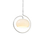 White glass Clérachic pendant with a chrome ring on a fine chain, shown on a plain white background.