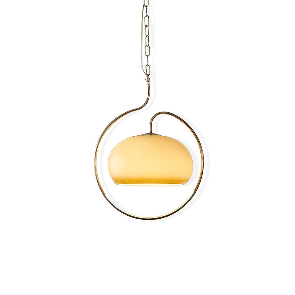 Pale yellow glass Clérachic pendant with a champagne-coloured ring, hanging on a fine chain against white.