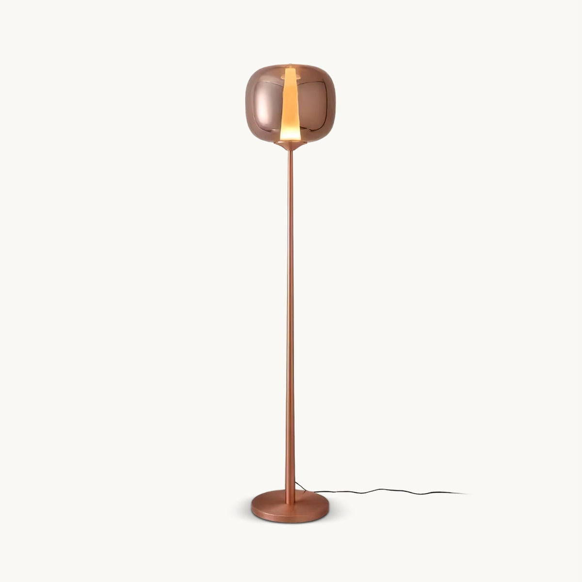 Rose gold Clérachic floor lamp with a rounded glass head and a bright vertical strip of light, on a plain white backdrop.