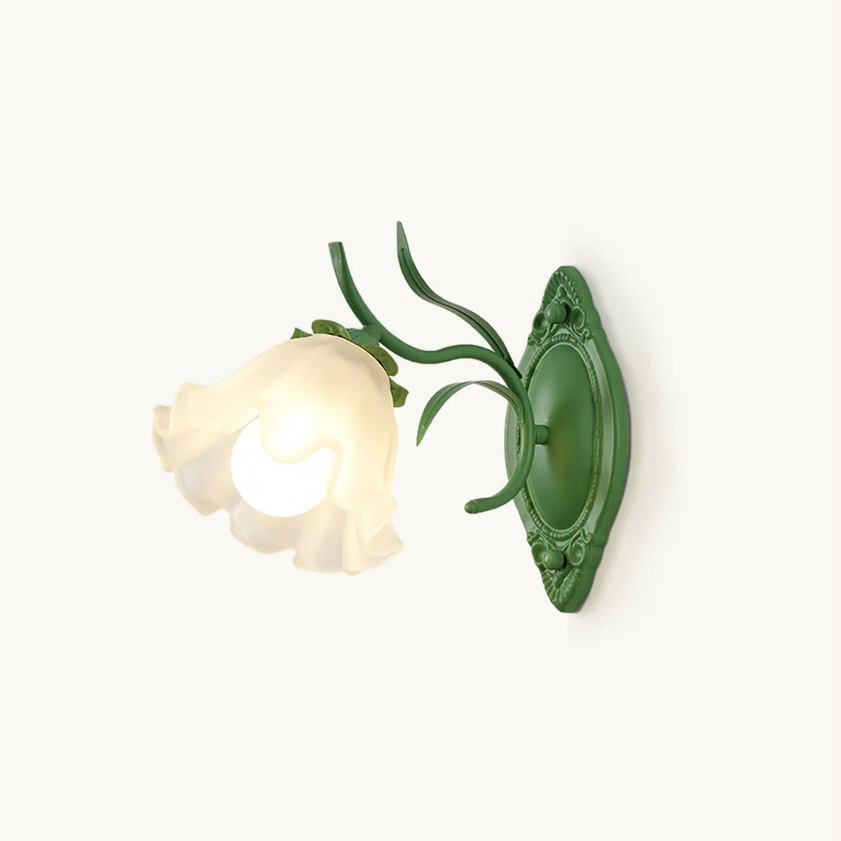 A green Clérachic wall light with one frosted glass flower shade and a bare bulb, on a plain white backdrop.