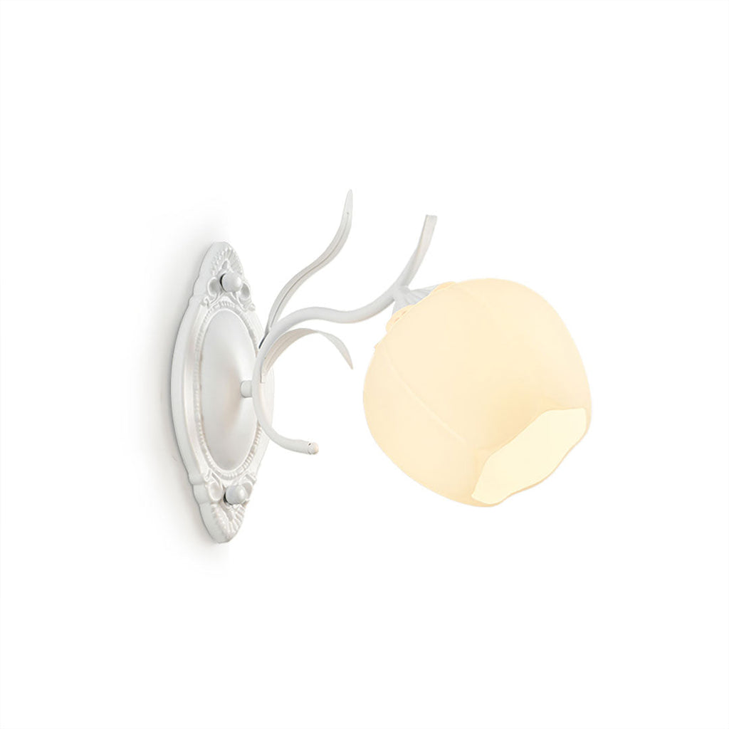 A white Clérachic wall light with a round opal glass shade and a carved oval backplate, on a white background.