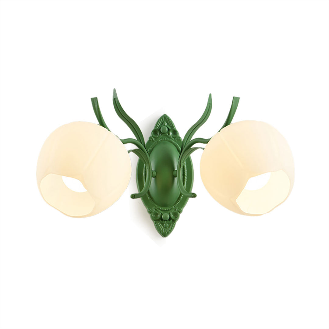 Green Clérachic double wall light with two rounded opal glass shades, shown on a plain white backdrop.