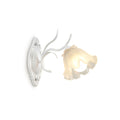 A white Clérachic wall light with a single ruffled flower shade and a branching arm, on a white background.