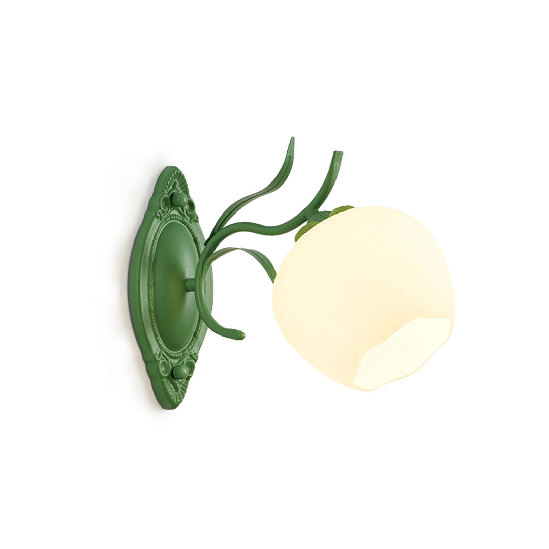 Side view of a green Clérachic wall light with one large opal glass shade and a carved oval backplate, on a white background.