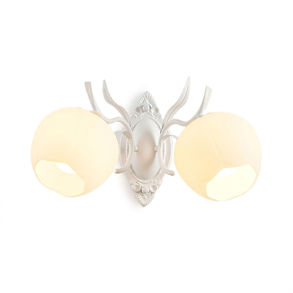 A white Clérachic double wall light with two opal glass shades and branching arms, on a white background.