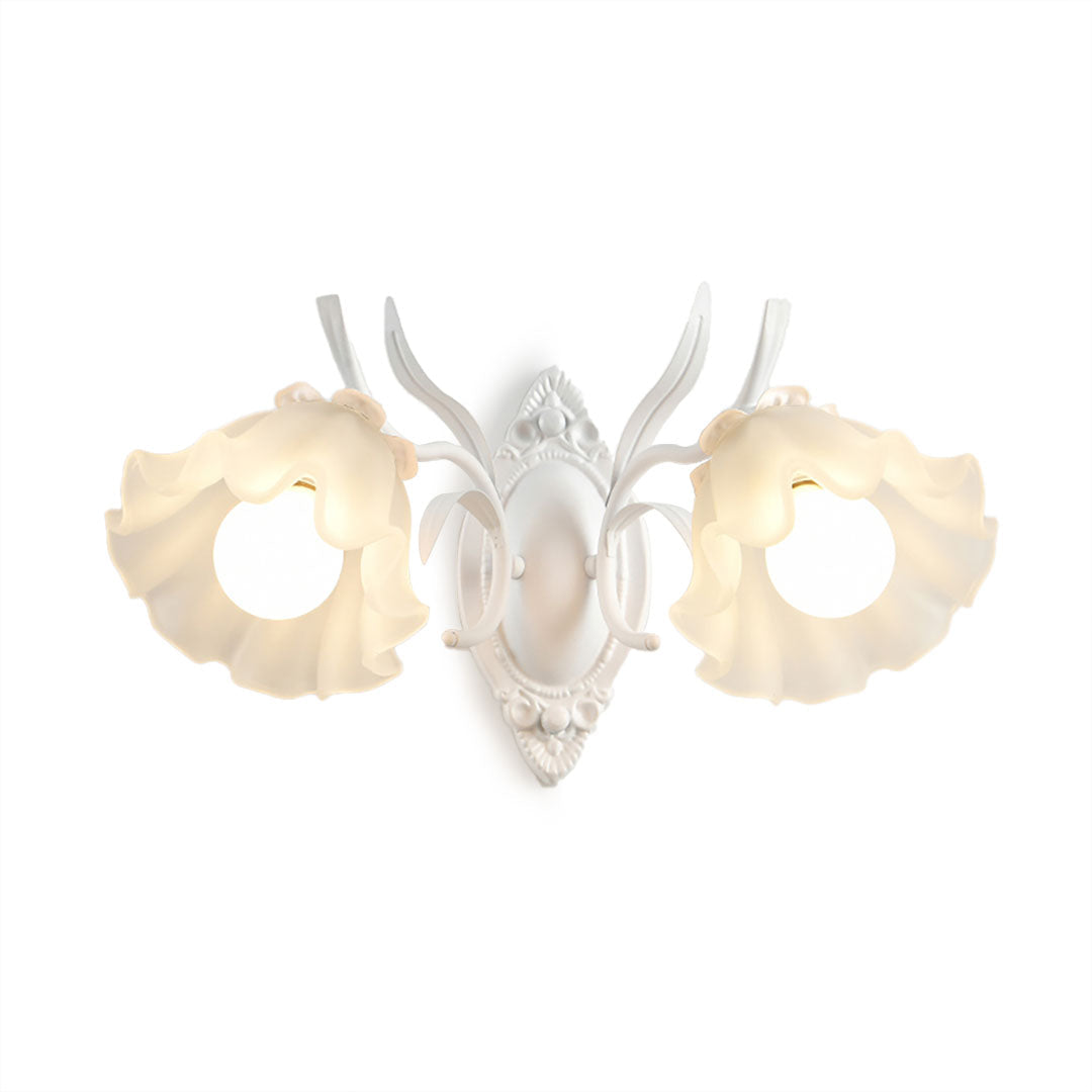 White Clérachic double wall light with two ruffled flower shades, lit, on a white background.