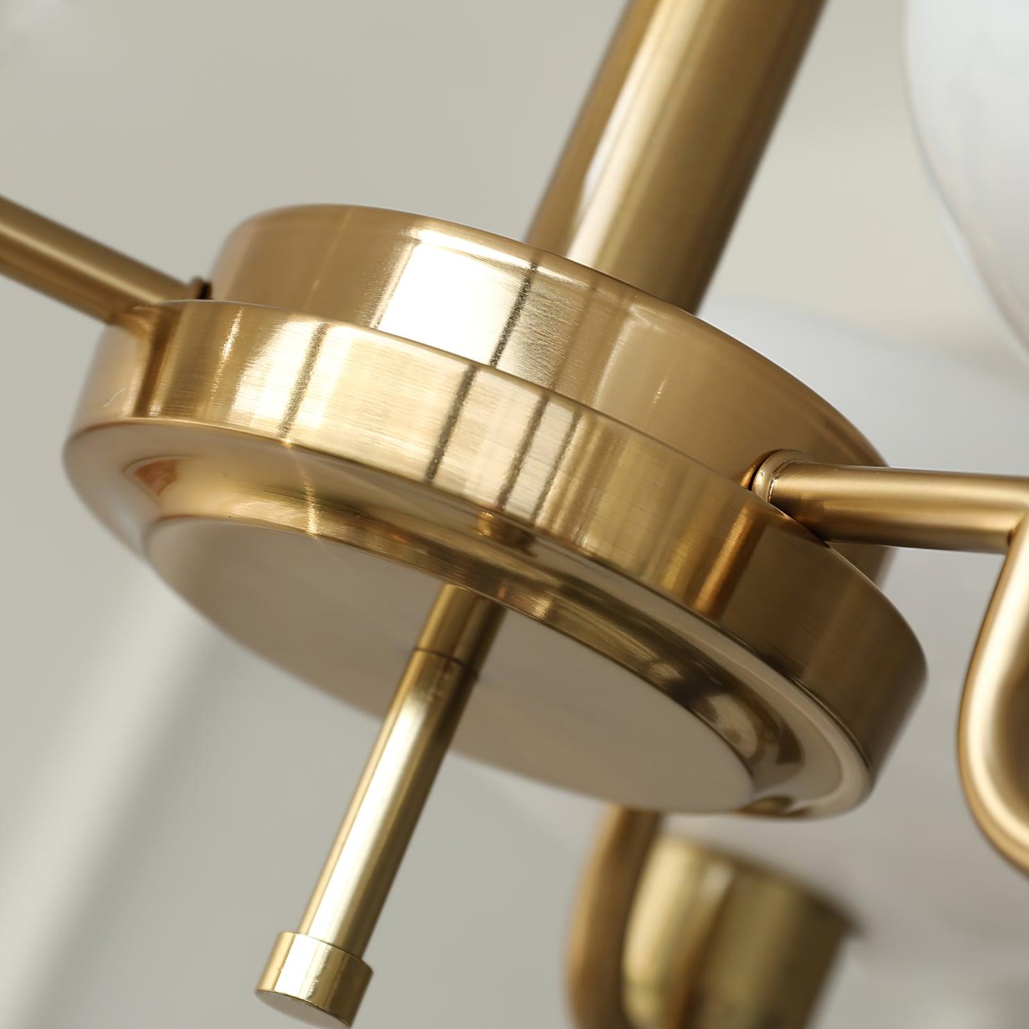 Detail of the Clérachic copper centre hub where the arms meet, with the small finial below.