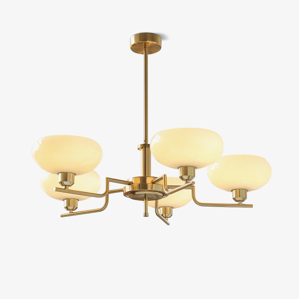 Clérachic five-head copper chandelier lit in studio, five glowing globes on stepped arms against grey.