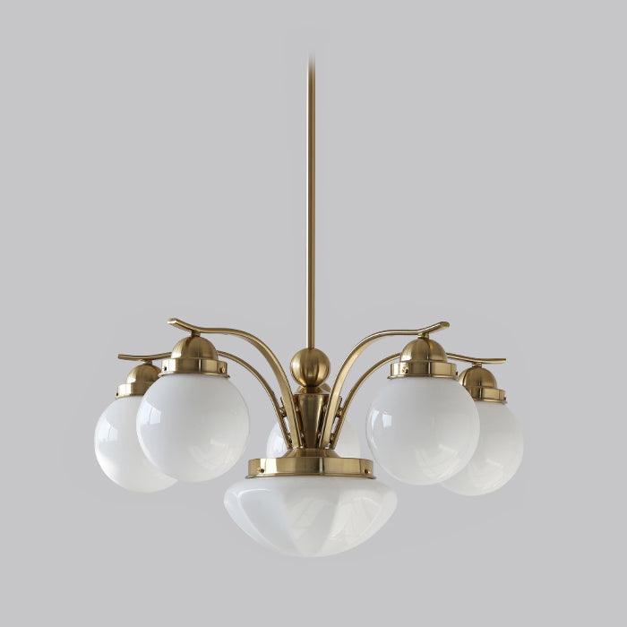 The Clérachic copper-plated glass globe chandelier, four lights, white globes and a bowl on a brushed copper stem.