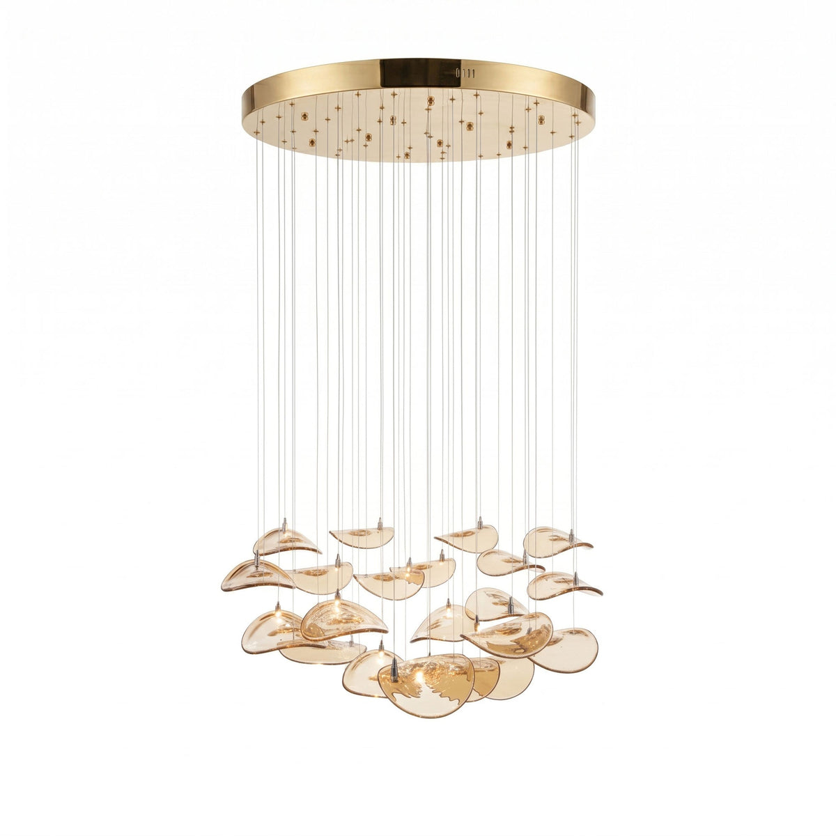 Gold round canopy with long cable drops and a layered group of rounded amber glass leaves, from this Clérachic pendant, on white.