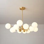 Glowing frosted orbs on slim brass arms, a Clérachic chandelier hung from a round brass canopy against a soft grey ceiling.