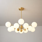 Brass-armed Clérachic chandelier with warm-glowing frosted orbs spread evenly around its hub.
