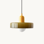 This Clérachic pendant on a plain white backdrop: a glossy olive-green metal disc with a rounded cap and a frosted glass globe beneath.
