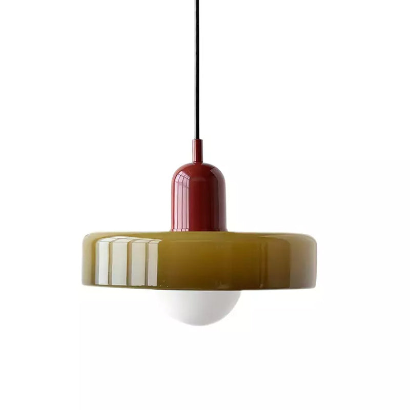 A Clérachic olive-green disc pendant with a deep red cap and a black cord, with its frosted globe below, on white.