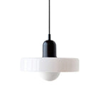 A white glossy disc with a black cap and black cord, a round frosted globe hanging below, on white, from Clérachic.