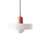 A glossy white disc with a pink cap, black cord and a frosted globe, shown on white, from Clérachic.