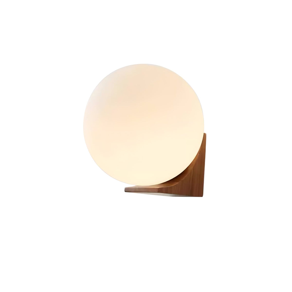 Glass orb and light wood bracket of this Clérachic wall light, cut out on a plain white background and softly lit.