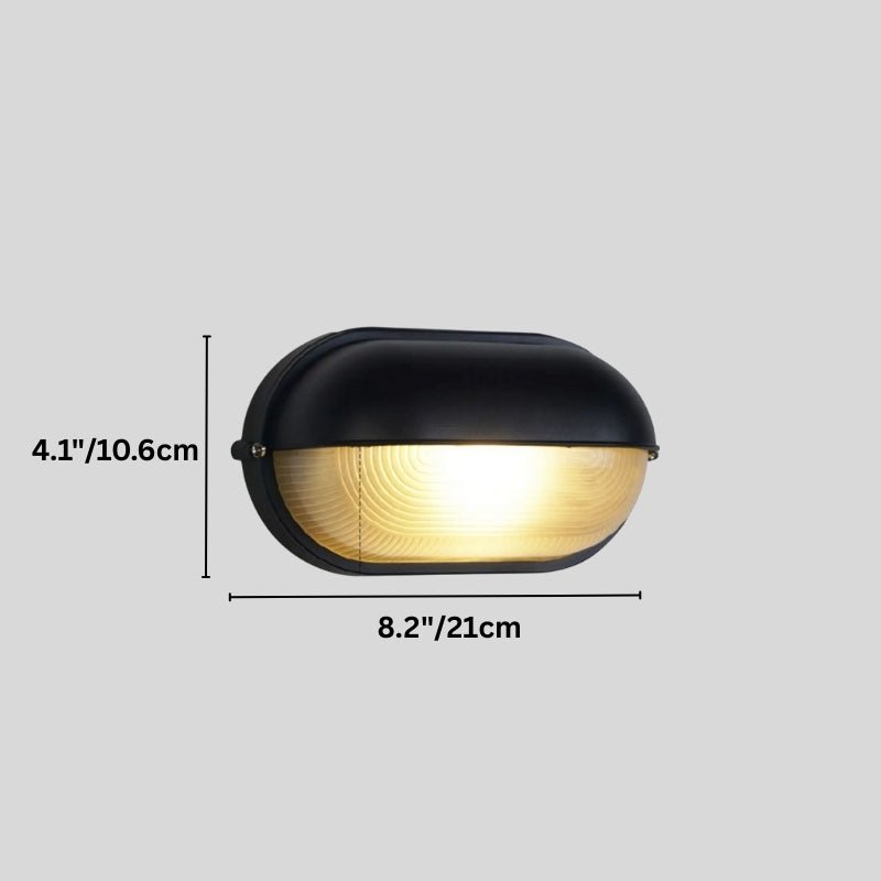 Clérachic smaller black oval wall lamp with hooded cap on a grey backdrop, with its height and width dimensioned in cm and inches.