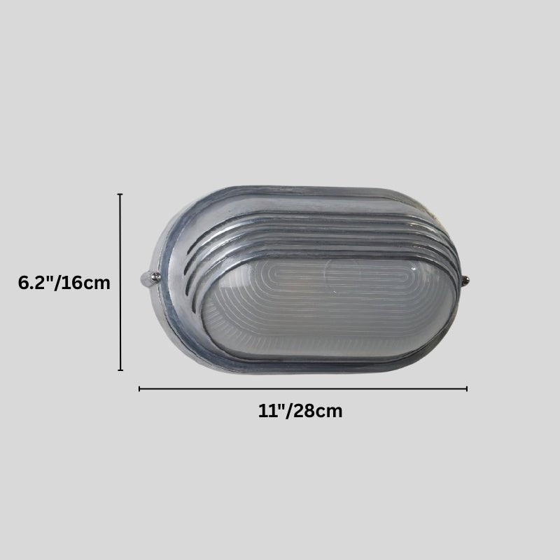Clérachic louvred oval wall lamp in grey metal with a frosted lens, on a plain grey backdrop with height and width marked.