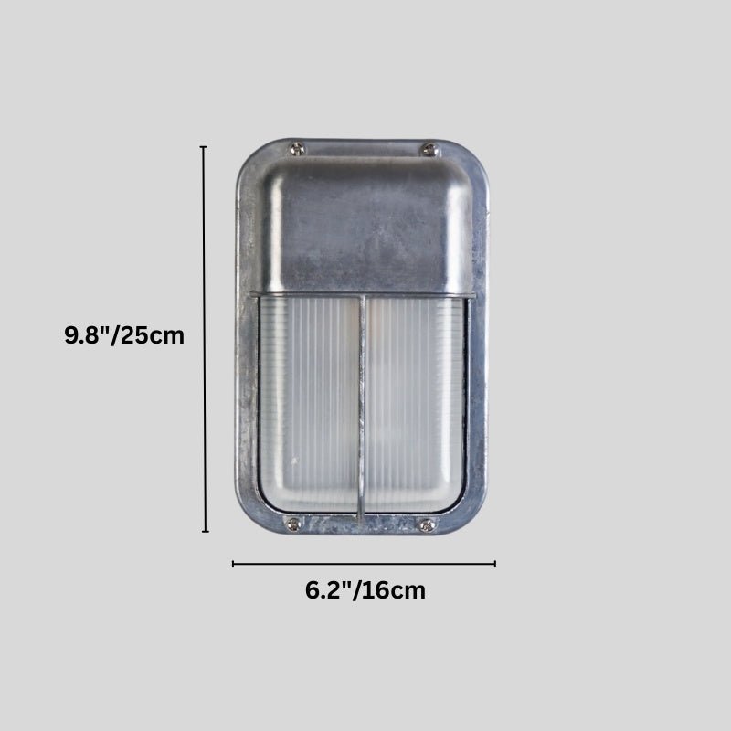Clérachic upright galvanised wall lamp with a ribbed glass panel, on a grey backdrop with height and width marked in cm and inches.